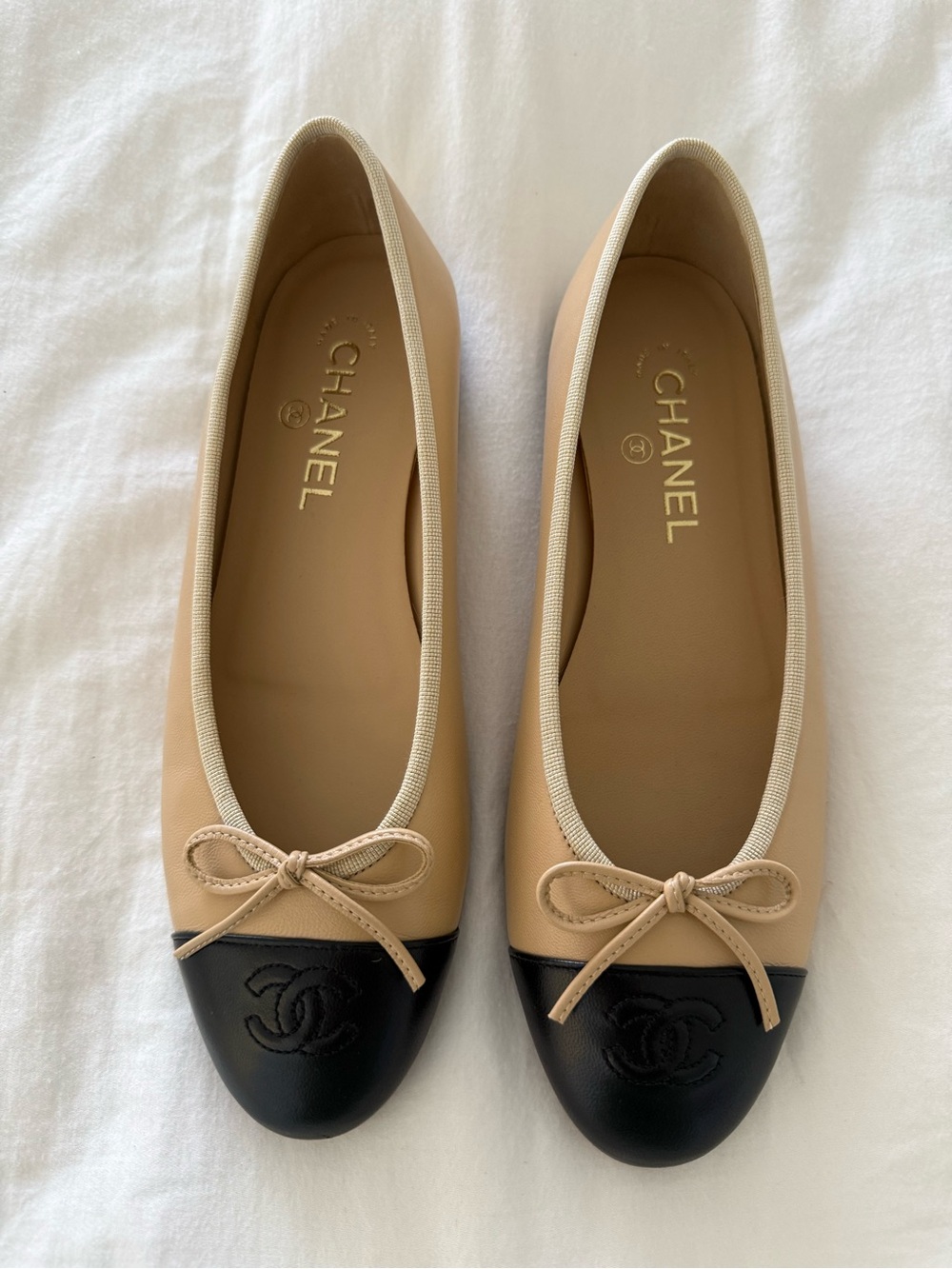 CHANEL Beige and Black Two-Tone Ballet Flats with CC Cap Toe